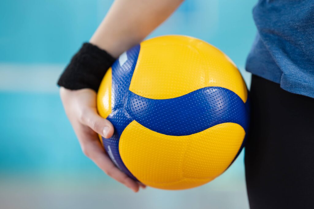 volleyball ball hands female player standing gym close up ball hands learner training mastering skills concept 1 - FRVolei